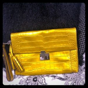 Liquid Gold Coach Crocodile Clutch
